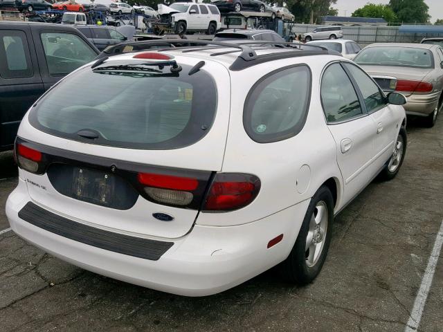 1FAFP58S4YG279292 - 2000 FORD TAURUS SE WHITE photo 4