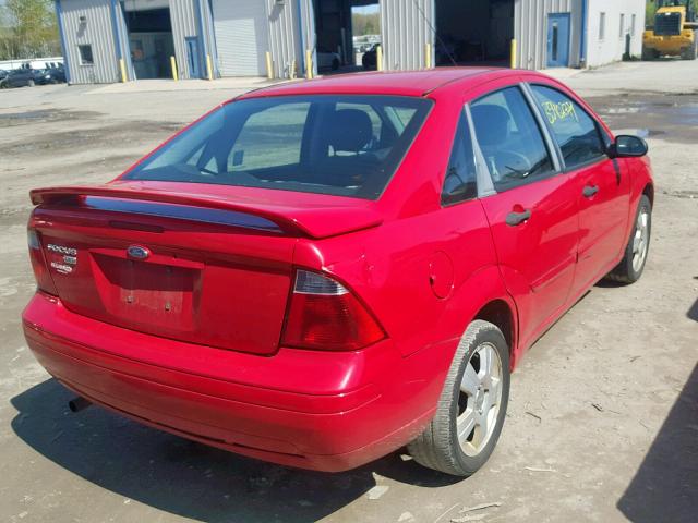 1FAFP34N97W311520 - 2007 FORD FOCUS ZX4 RED photo 4