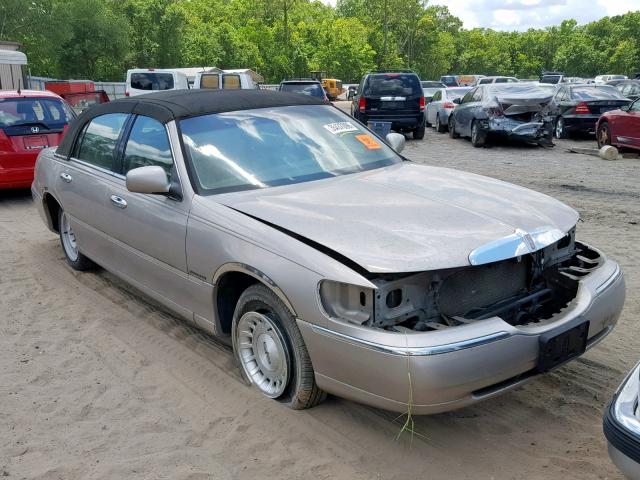 1LNHM81WXXY690789 - 1999 LINCOLN TOWN CAR E BEIGE photo 1