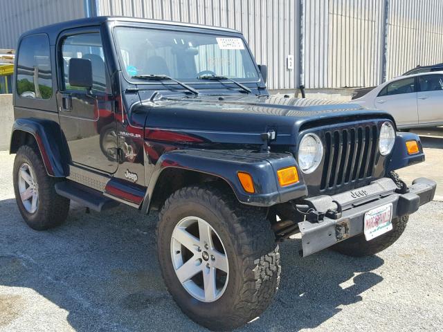 1J4FA59S32P717666 - 2002 JEEP WRANGLER / BLACK photo 1