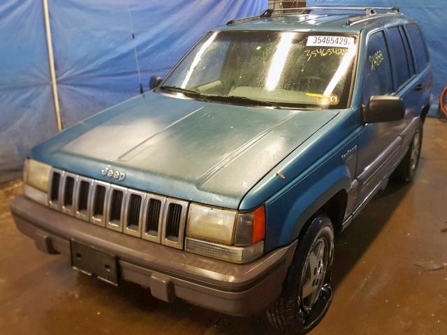 1J4GZ58S7RC220622 - 1994 JEEP GRAND CHER BLUE photo 2