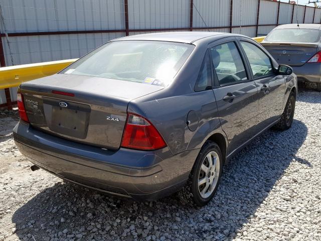 1FAFP34N45W187749 - 2005 FORD FOCUS ZX4  photo 4