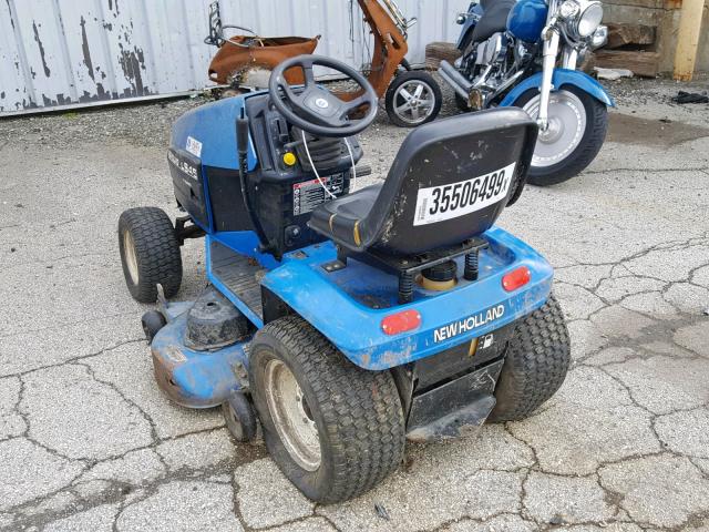 T6D0723 - 2009 NEWH TRACTOR BLUE photo 3