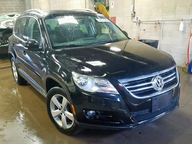 WVGBV7AX7AW525226 - 2010 VOLKSWAGEN TIGUAN BLACK photo 1