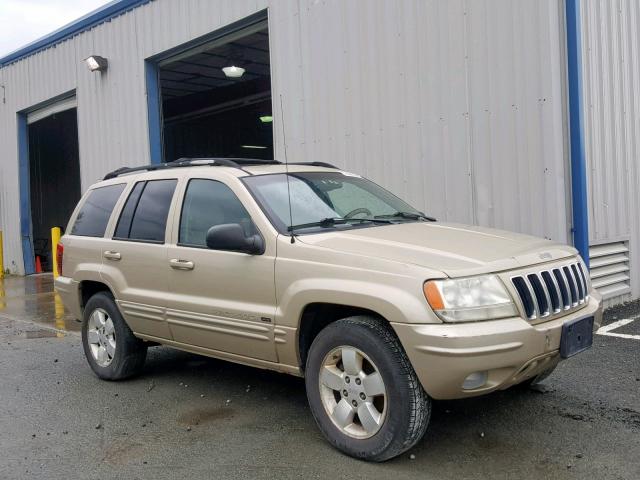 1J4GW58N81C692397 - 2001 JEEP GRAND CHER GOLD photo 1