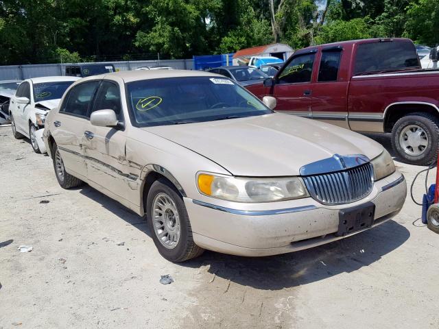 1LNHM83W8XY641409 - 1999 LINCOLN TOWN CAR C TAN photo 1