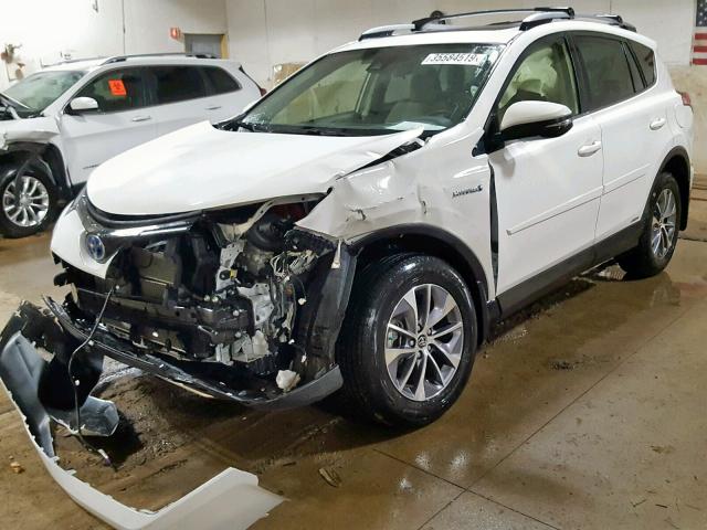 JTMRJREV3JD173101 - 2018 TOYOTA RAV4 HV LE WHITE photo 2