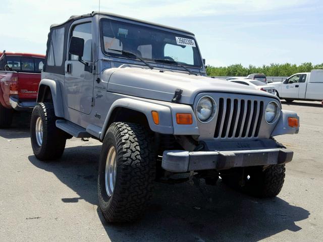 1J4FA49S71P341613 - 2001 JEEP WRANGLER / SILVER photo 1