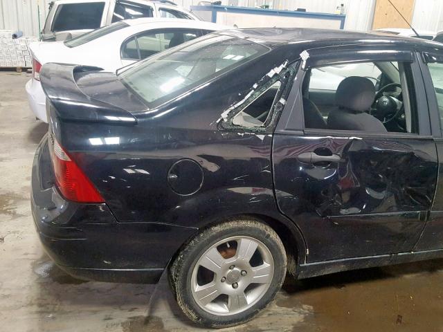 1FAFP34N75W112169 - 2005 FORD FOCUS ZX4 BLACK photo 9