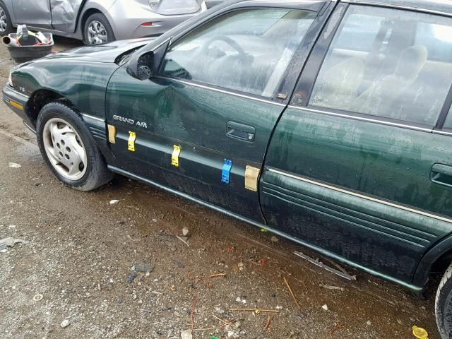 1G2NE55M7SC745043 - 1995 PONTIAC GRAND AM S GREEN photo 9