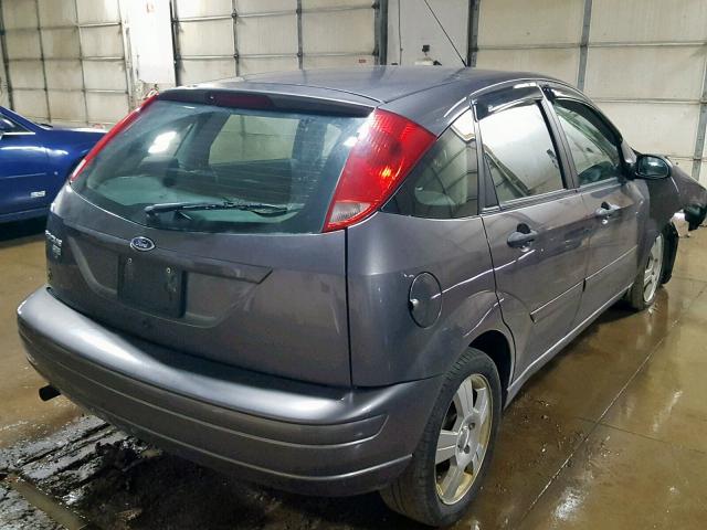 1FAHP37N37W299028 - 2007 FORD FOCUS ZX5 GRAY photo 4