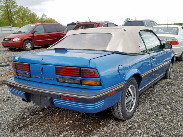 1G2JB34T4M7637947 - 1991 PONTIAC SUNBIRD LE BLUE photo 4