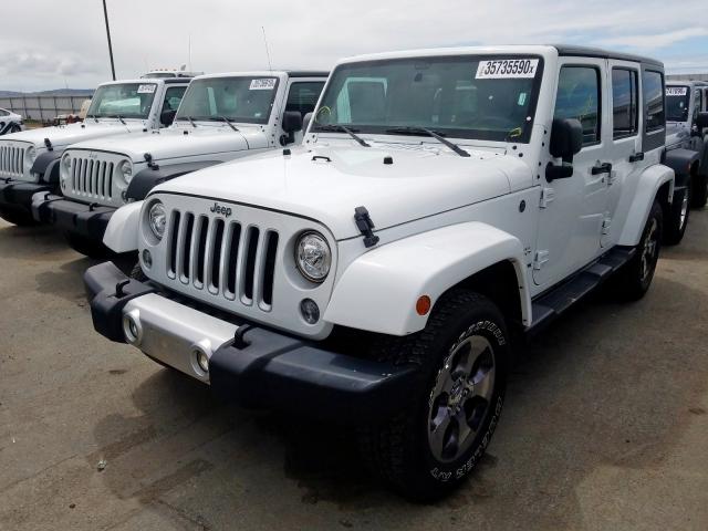 1C4HJWEGXJL921876 - 2018 JEEP WRANGLER UNLIMITED SAHARA  photo 2