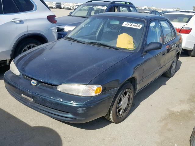 1Y1SK5285XZ447976 - 1999 CHEVROLET GEO PRIZM GREEN photo 2