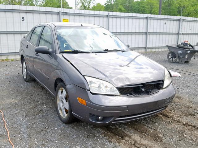 1FAFP34N87W181407 - 2007 FORD FOCUS ZX4 GRAY photo 1