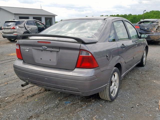 1FAFP34N87W181407 - 2007 FORD FOCUS ZX4 GRAY photo 4