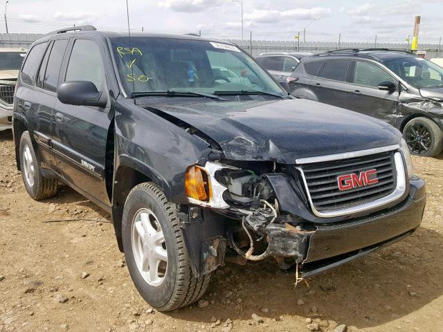 1GKDT13S642336374 - 2004 GMC ENVOY BLACK photo 1