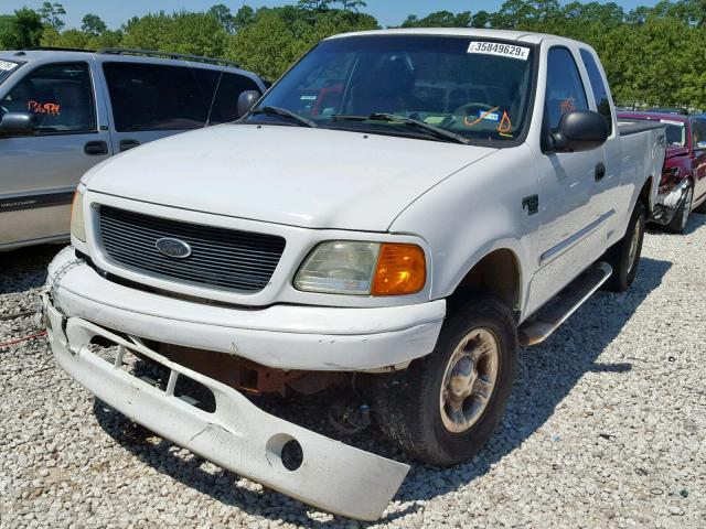 2FTRX18W04CA72784 - 2004 FORD F-150 HERI WHITE photo 2