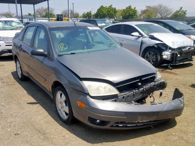 1FAFP34N55W110307 - 2005 FORD FOCUS ZX4 GRAY photo 1