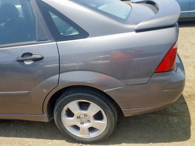 1FAFP34N55W110307 - 2005 FORD FOCUS ZX4 GRAY photo 9