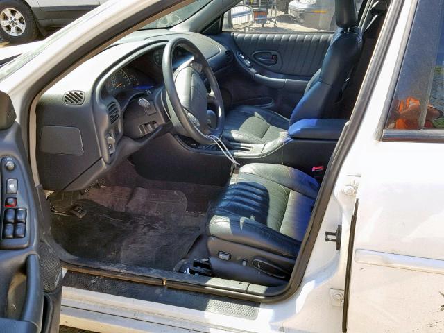 1G2WR5214XF243034 - 1999 PONTIAC GRAND PRIX WHITE photo 5