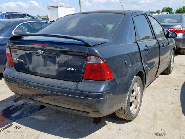 1FAHP38Z16W239765 - 2006 FORD FOCUS ZX4 BLACK photo 4