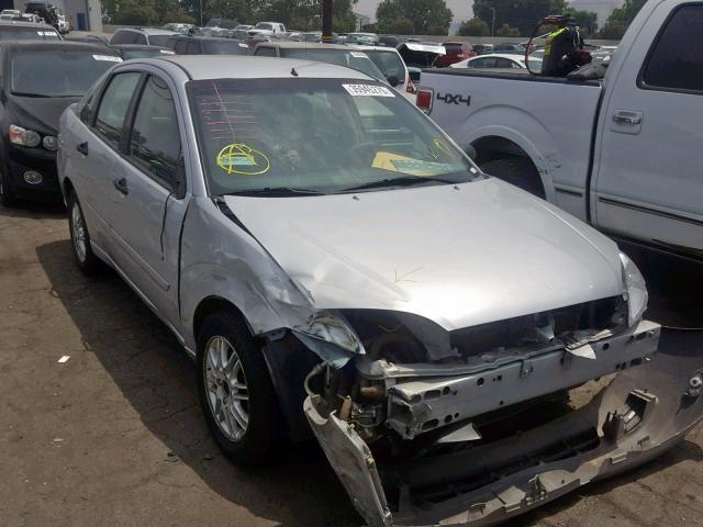 1FAFP34NX6W146768 - 2006 FORD FOCUS ZX4 SILVER photo 1