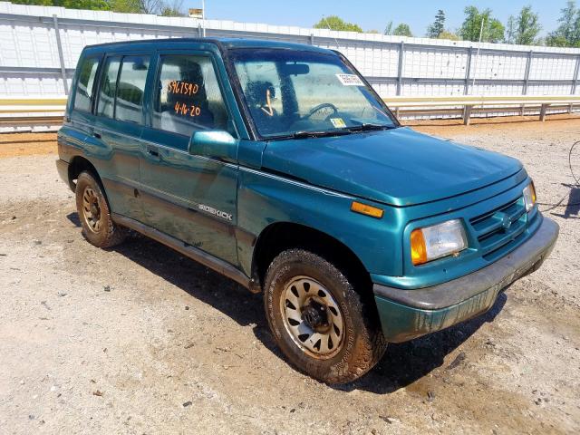 2S3TD03V7V6406284 - 1997 SUZUKI SIDEKICK JX  photo 1