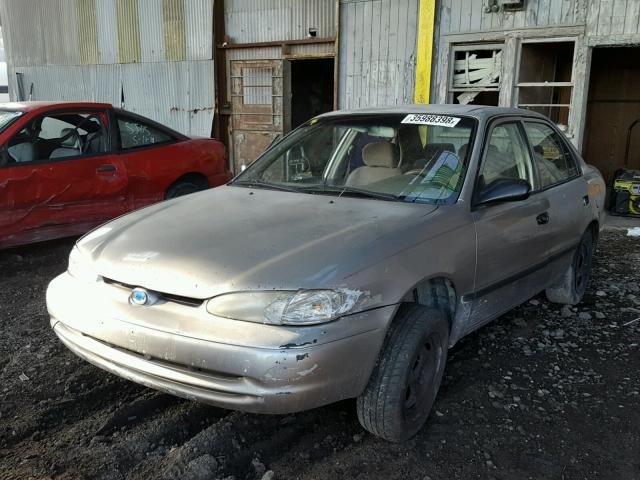 1Y1SK5283WZ426607 - 1998 CHEVROLET GEO PRIZM TAN photo 2