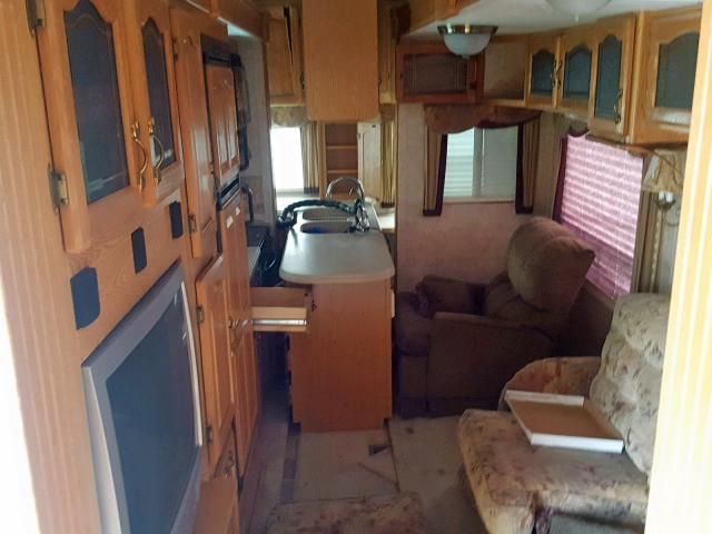 4YDF329245D511337 - 2005 KEYSTONE MONTANA WHITE photo 5