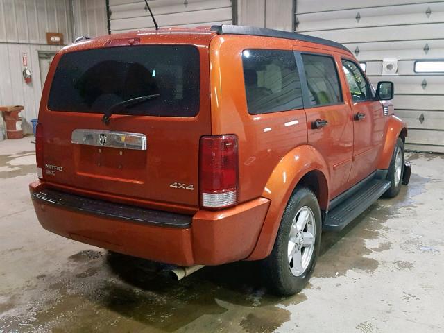 1D8GU58K47W555421 - 2007 DODGE NITRO SLT ORANGE photo 4