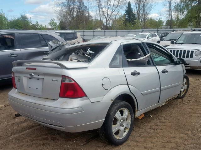 1FAFP34NX6W129274 - 2006 FORD FOCUS ZX4 SILVER photo 4