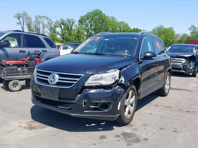 WVGBV7AX0AW523558 - 2010 VOLKSWAGEN TIGUAN SE BLACK photo 2