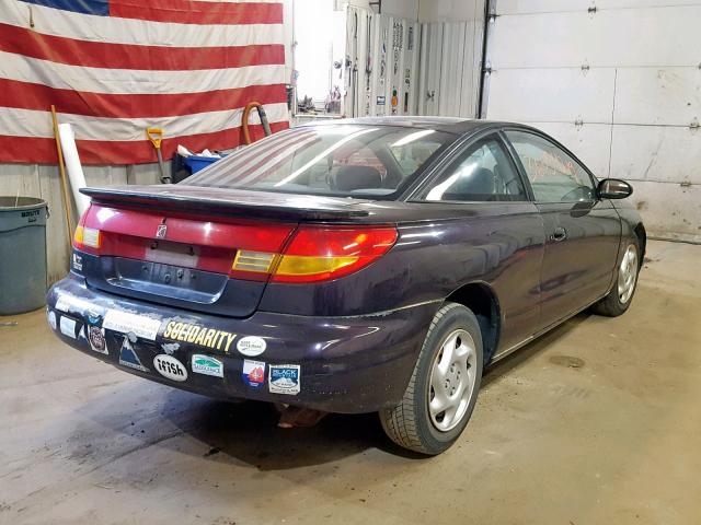 1G8ZY1276XZ312307 - 1999 SATURN SC2 PURPLE photo 4