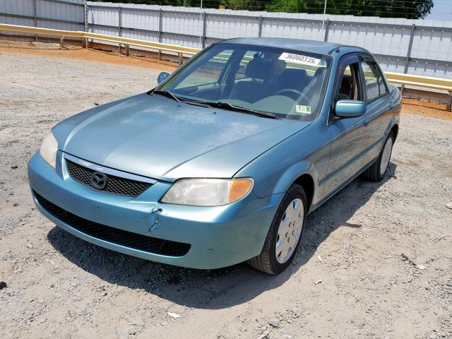 JM1BJ225721563232 - 2002 MAZDA PROTEGE DX TEAL photo 2