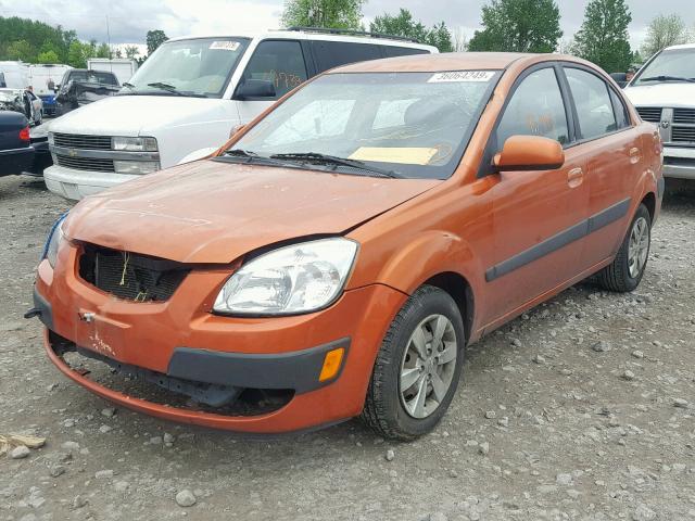 KNADE223896460956 - 2009 KIA RIO BASE ORANGE photo 2