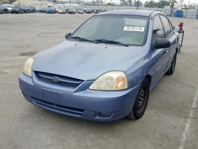 KNADC125646308779 - 2004 KIA RIO PURPLE photo 2