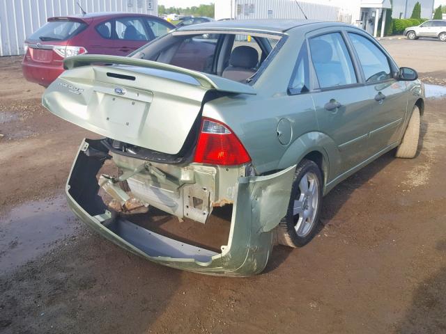 1FAHP34NX7W283056 - 2007 FORD FOCUS ZX4 GREEN photo 4