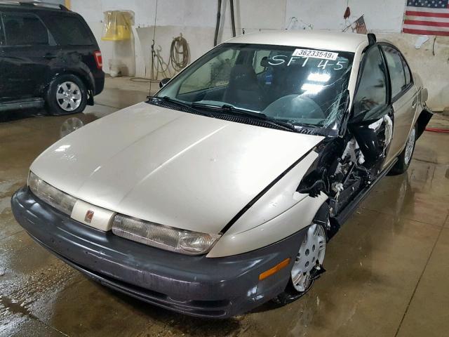 1G8ZG5289XZ247164 - 1999 SATURN SL1 GOLD photo 2