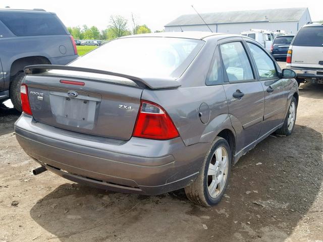 1FAFP34N45W200001 - 2005 FORD FOCUS ZX4 GRAY photo 4