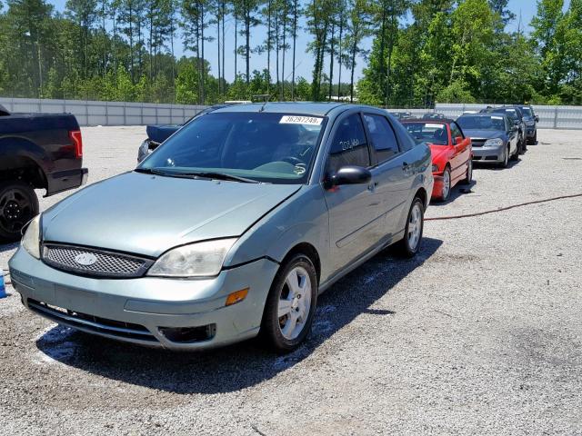 1FAFP34N16W116302 - 2006 FORD FOCUS ZX4 GREEN photo 2