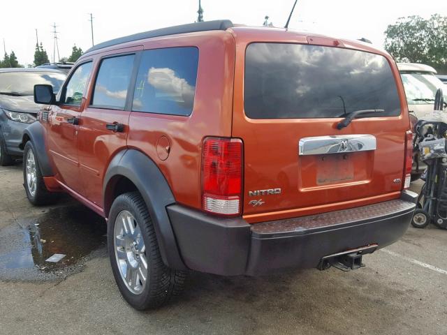 1D8GT58697W733636 - 2007 DODGE NITRO R/T ORANGE photo 3