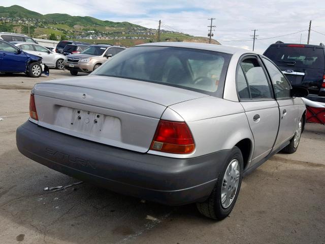 1G8ZH5281XZ373824 - 1999 SATURN SL1 SILVER photo 4