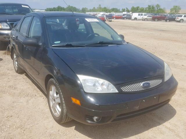 1FAFP38Z25W189531 - 2005 FORD FOCUS ZX4 BLACK photo 1