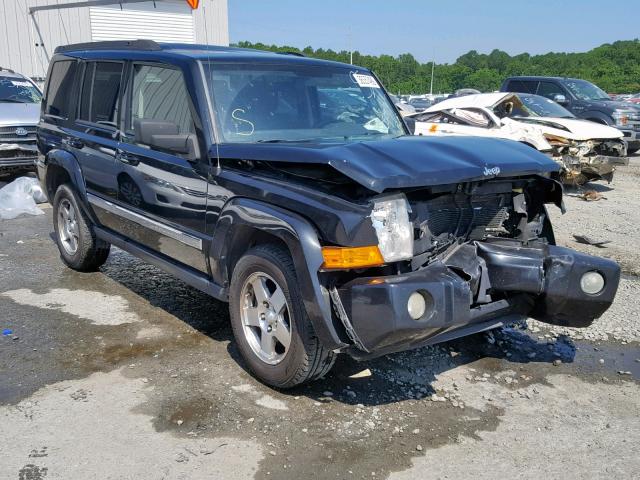 1J4RG4GK1AC112897 - 2010 JEEP COMMANDER BLACK photo 1