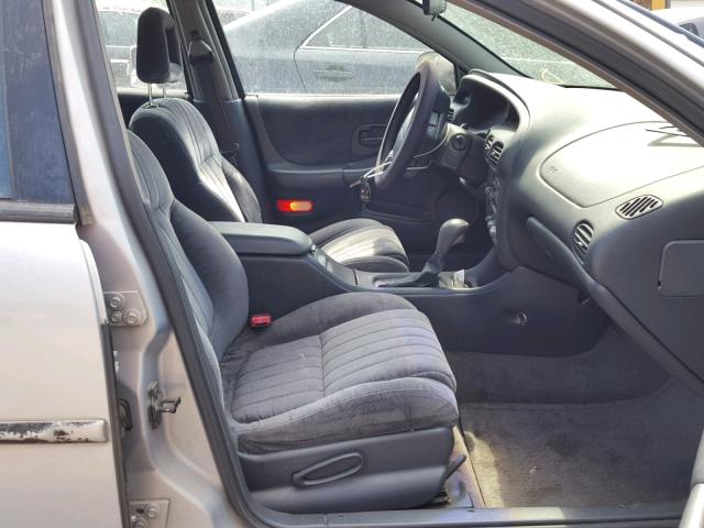 1G2WP52K3XF335881 - 1999 PONTIAC GRAND PRIX GRAY photo 5