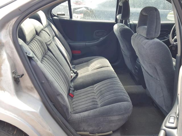 1G2WP52K3XF335881 - 1999 PONTIAC GRAND PRIX GRAY photo 6
