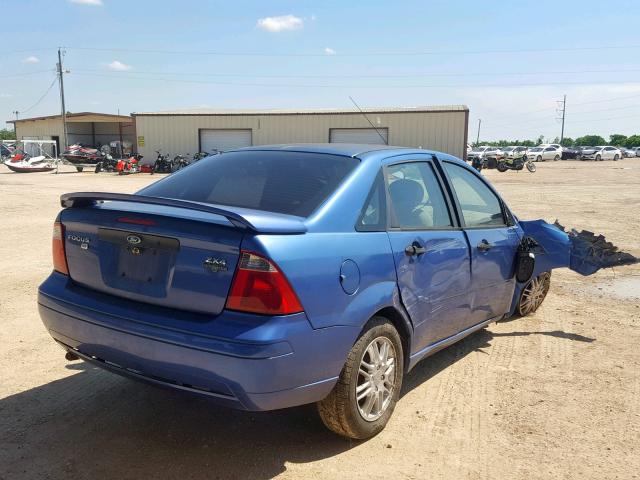 1FAFP34N15W157124 - 2005 FORD FOCUS ZX4 BLUE photo 4