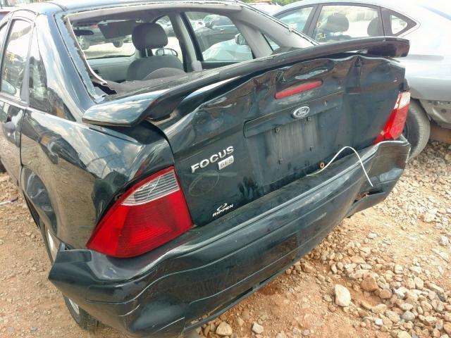 1FAHP34N57W356480 - 2007 FORD FOCUS ZX4 BLACK photo 9