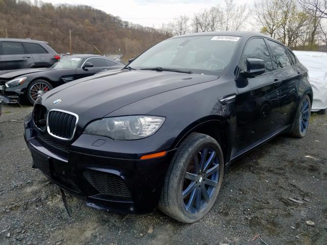 5YMGZ0C59BLK13985 - 2011 BMW X6 M  photo 2